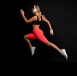run-hard-get-into-shape-woman-run-black-background-jogger-jump-with-long-run-fit-athlete-fashion-sportswear-athletic-female-sprinter-runner-active-dynamic-run-fast-finish-soon — Un Swede