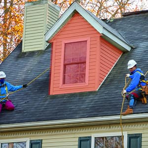 Highlighting a dormer roof on a home, which adds space and light to a top floor or attic.