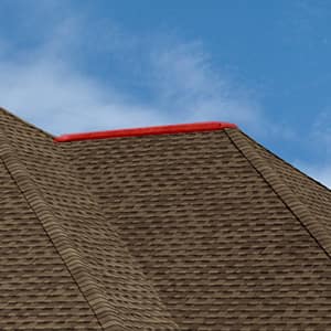 Highlighting the hip on a roof, the outward diagonal joints where two roof slopes meet.