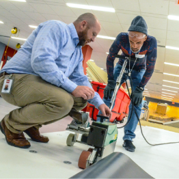 GAF roofer teaching proper installation in our roofer school, GAF Roofing Academy